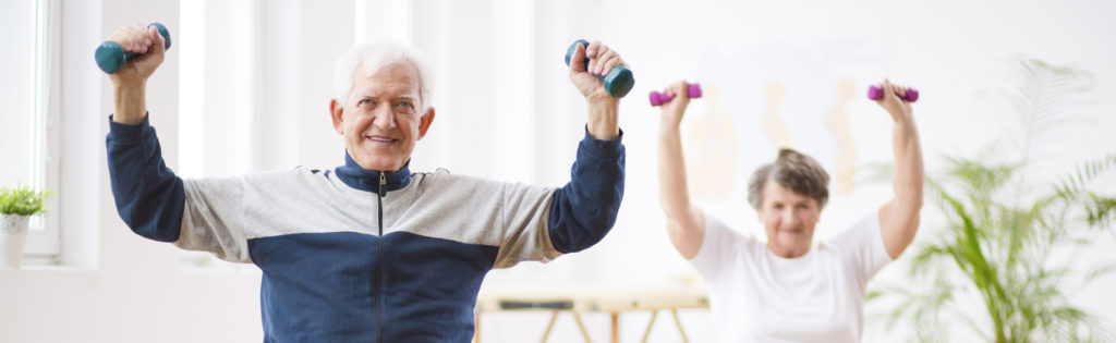 Panorama capture of two senior man and woman working out with weights