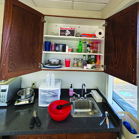 Neat kitchen with organized shelves.