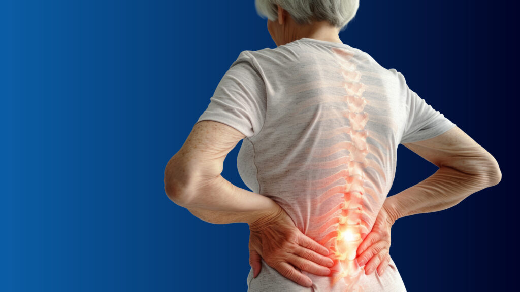 Elderly woman experiencing back pain