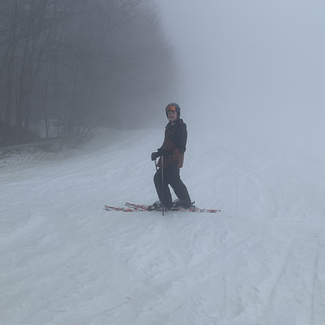 skier on snowy trail