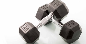 Dumbells over white background and with reflections